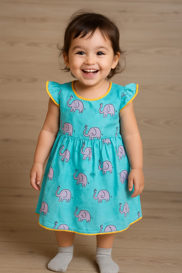 Girl wearing handmade block printed silk cotton frock in traditional Indian design (age 2-12 years)