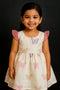Girl wearing handmade block printed silk cotton frock in traditional Indian design (age 2-12 years)