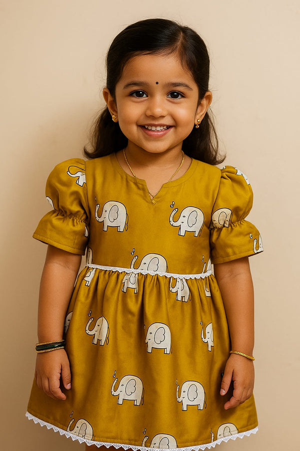Girl wearing handmade block printed silk cotton frock in traditional Indian design (age 2-12 years)