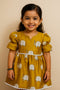 Girl wearing handmade block printed silk cotton frock in traditional Indian design (age 2-12 years)