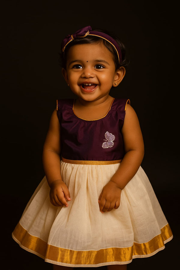 Girl wearing traditional Kerala set mundu cotton dress for Onam