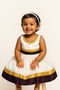 Girl wearing traditional Kerala set mundu cotton dress for Onam