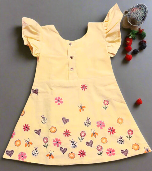 Girl wearing pure cotton Kantha embroidered frock – age 2 years