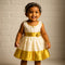 Girl wearing traditional Kerala set mundu cotton dress for Onam

